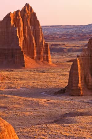 A desert landscape featuring red rock cathedrals.