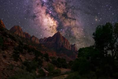 After the sun sets and the orange glow leaves Zion’s canyon walls, the park falls under a dark sky of endless stars.