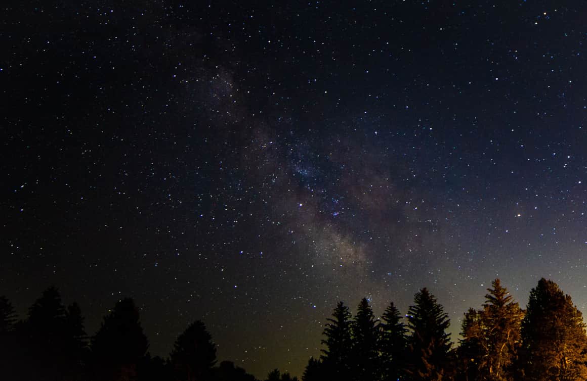 The Milky Way lights up the summer night sky over Huntsville, Utah.