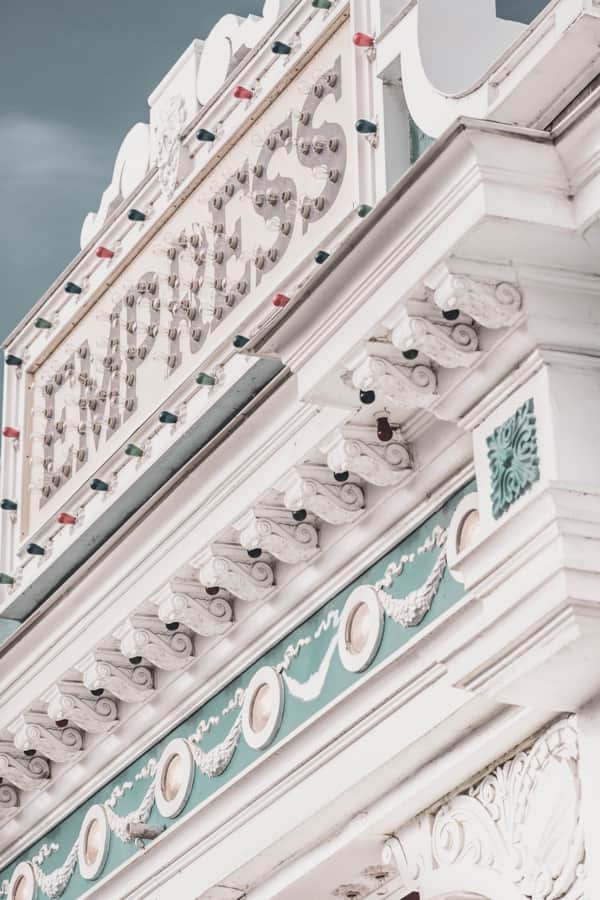 The Empress Theatre stands out with its neo-classical architecture.