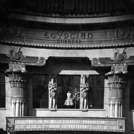 Peery's facade is bordered by two ornate columns and decorated with Egyptian statues and hieroglyphics, pictured here around 1925.
