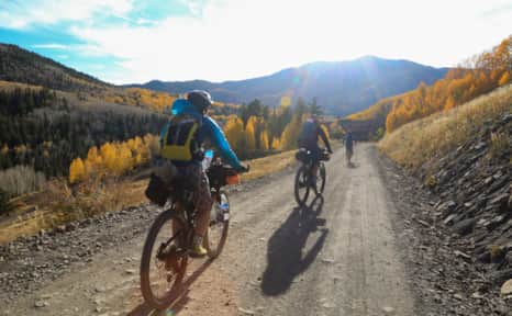 You'll traverse the range into Elk Ridge on old mining roads turned scenic back-way dirt/gravel roads.
