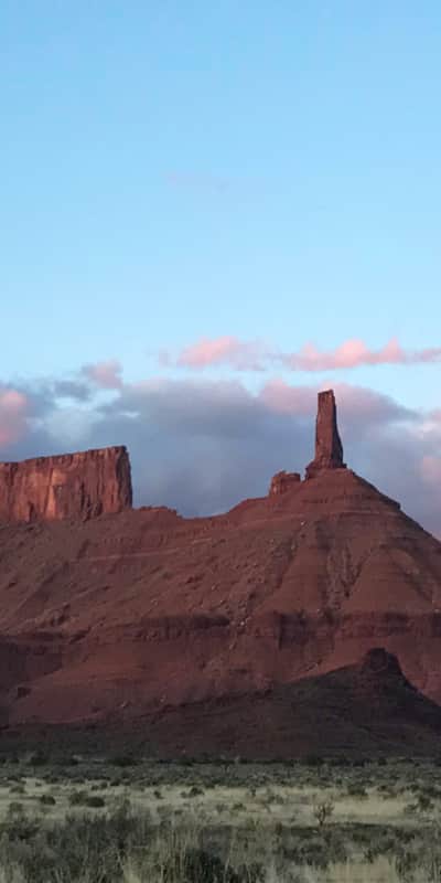 The last light of day begins to turn the red soil to purple.