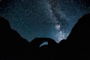 Under cover of the Milky Way, the bridge cuts a dramatic figure across pristine night skies.