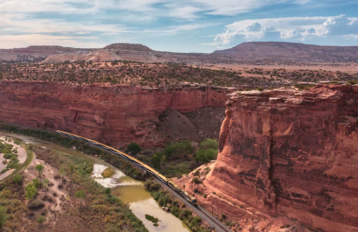 The Moab to Denver route can be traveled eastbound, westbound, or with a return journey, and includes an overnight hotel stay in Glenwood Springs, Colorado.