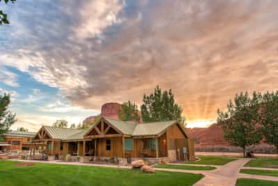 Sorrel River Ranch, near Moab, located on 240 acres alongside the Colorado River, with well-appointed hotel rooms, riverfront cabins, and an entire ranch house suited for a group.