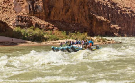 Participants can enjoy a mild float or whitewater rapids through Utah's red rock canyons.