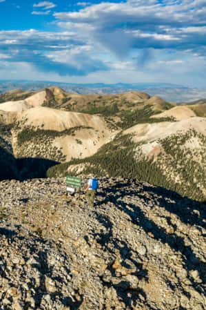 A range of sandy and rocky mountain peaks.