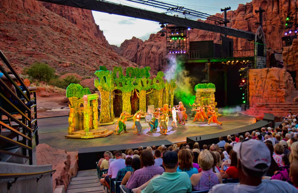 Tuacahn Center for the Arts hosts three Broadway-caliber live shows each year, set against a dramatic backdrop of 1,500-foot red rock cliffs