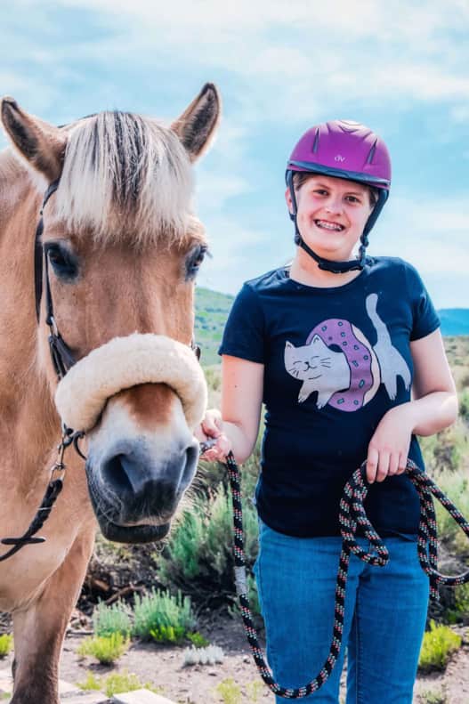 Penni Duzy with golden Norwegian Fjord horse, Rebecca Dill.