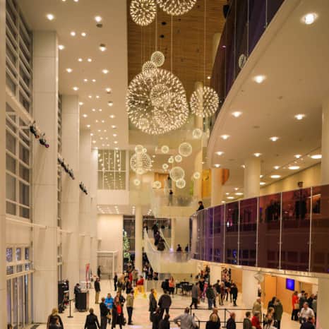 The Eccles Theater is easily recognized by its spectacular five-story glass lobby and distinctive chandeliers.