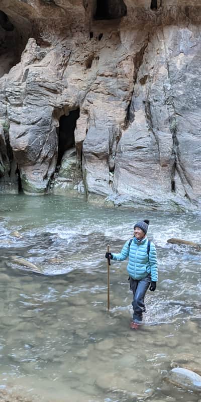 During winter, the popular river trail known as The Narrows envelopes hikers in solitude with it's ice-laden sandstone cliffs.