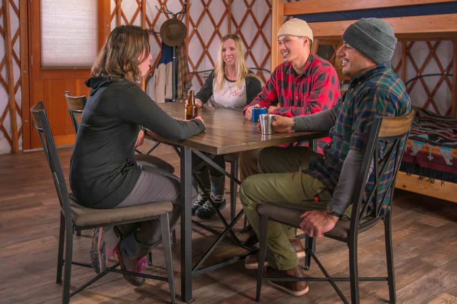 After a day of skiing or hiking, yurts are a great gathering place for friends.