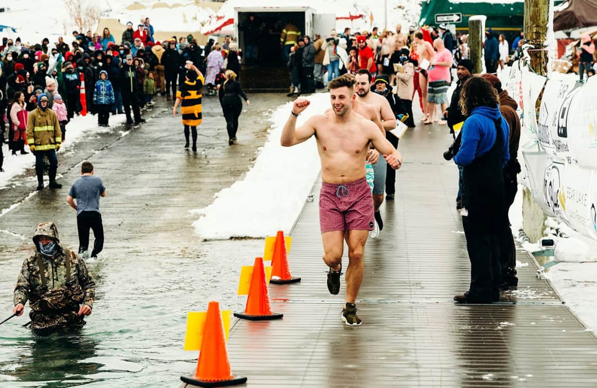 Most are in costume, some in swimsuits, some fully-clothed, and most entered the water with smiles on their faces.